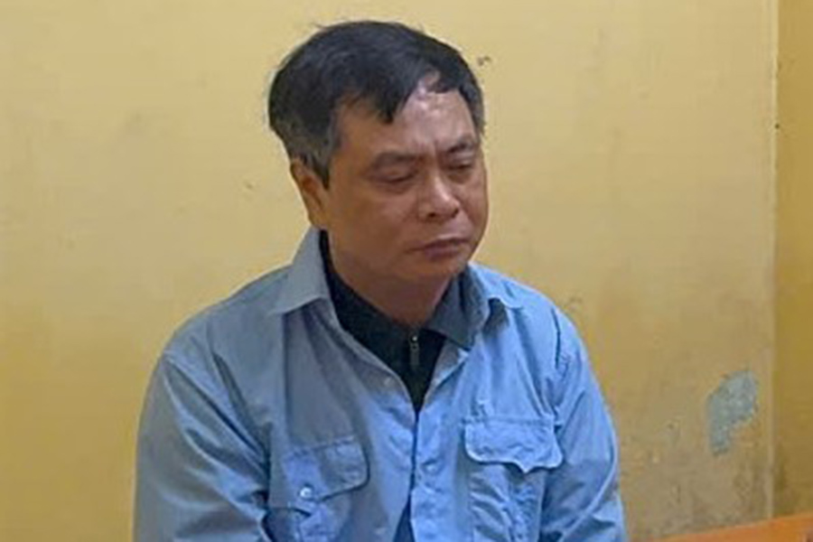 Pham Van Long - Hieu truong Truong Cao dang Du lich Ha Noi bi khoi to lien quan vu chi tien boi duong A80. Anh: Cong an Ha Noi