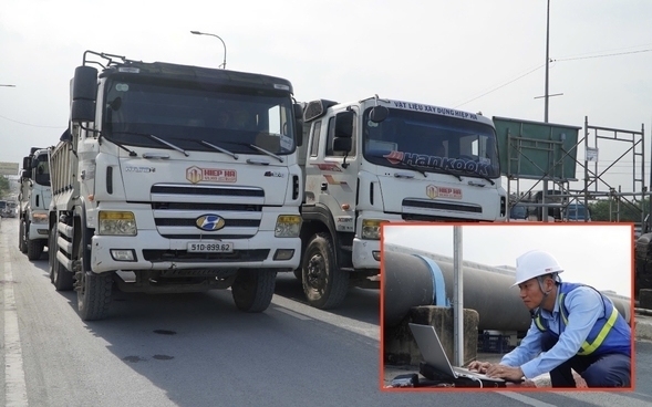 On the afternoon of December 17, 10 trucks, each weighing 25-27 tons, were mobilized to test the load-bearing structure of Binh Phuoc 1 Bridge after a period of clearing the clearance.
