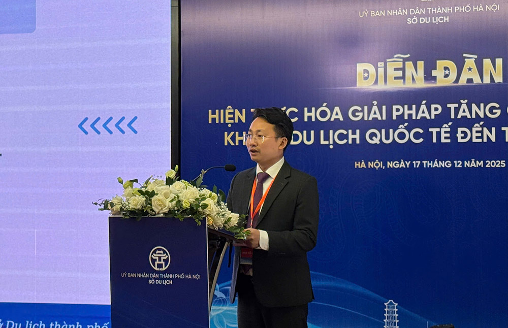 Ong Tran Trung Hieu - Pho giam doc So Du lich Ha Noi phat bieu tai Dien dan “Hien thuc hoa giai phap tang cuong thu hut khach du lich quoc te den Thu do Ha Noi”. Anh: Thanh Mai