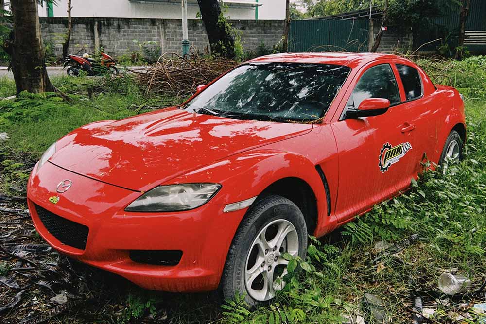 The rare orange-red painted Mazda RX-8 suddenly appeared in Vietnam, attracting the attention of the JDM sports car enthusiast community. Photo: Ho Hieu