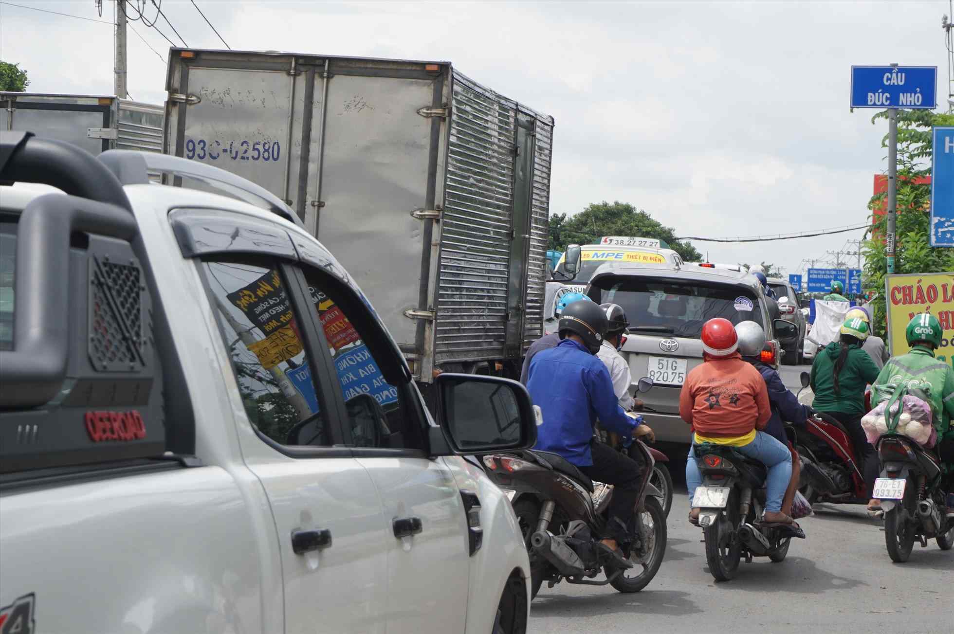 Cau Duc Nho thanh nut that co chai gay ket xe Quoc lo 13. Anh: Minh Quan