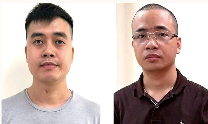 Bị can Hoàng Quang Thịnh (trái) và La Khắc Minh trong vụ án sản xuất sữa giả. Ảnh: Bộ Công an