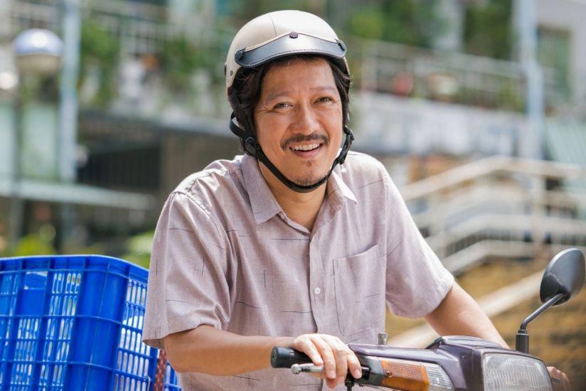 Truong Giang interpreta a un padre trabajador en la pelicula Tet 2026. Foto: Equipo de filmacion