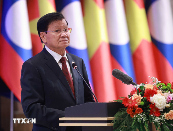 Tong Bi thu, Chu tich nuoc Lao Thongloun Sisoulith phat bieu. Anh: TTXVN