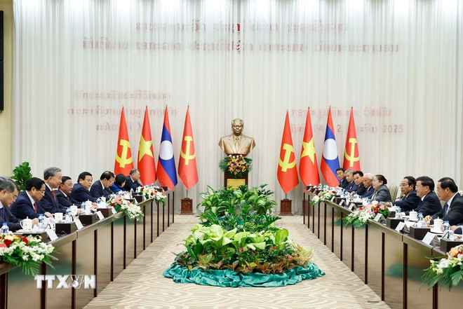 General Secretary To Lam and General Secretary and President of Laos Thongloun Sisoulith co-chaired the High-level Meeting between the Communist Party of Vietnam and the Lao People's Revolutionary Party. Photo: VNA