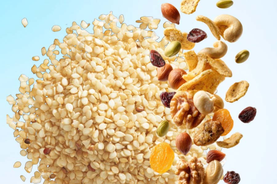 Benefits of sesame seeds, dried nuts and dried fruits for overall health. Graphics: Thien Nhan