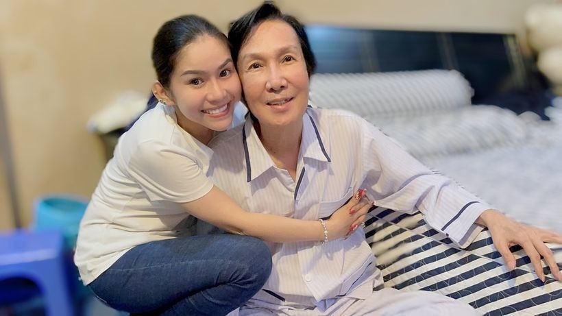Binh Tinh and her adoptive father, Meritorious Artist Vu Linh. Photo: Provided by the artist.
