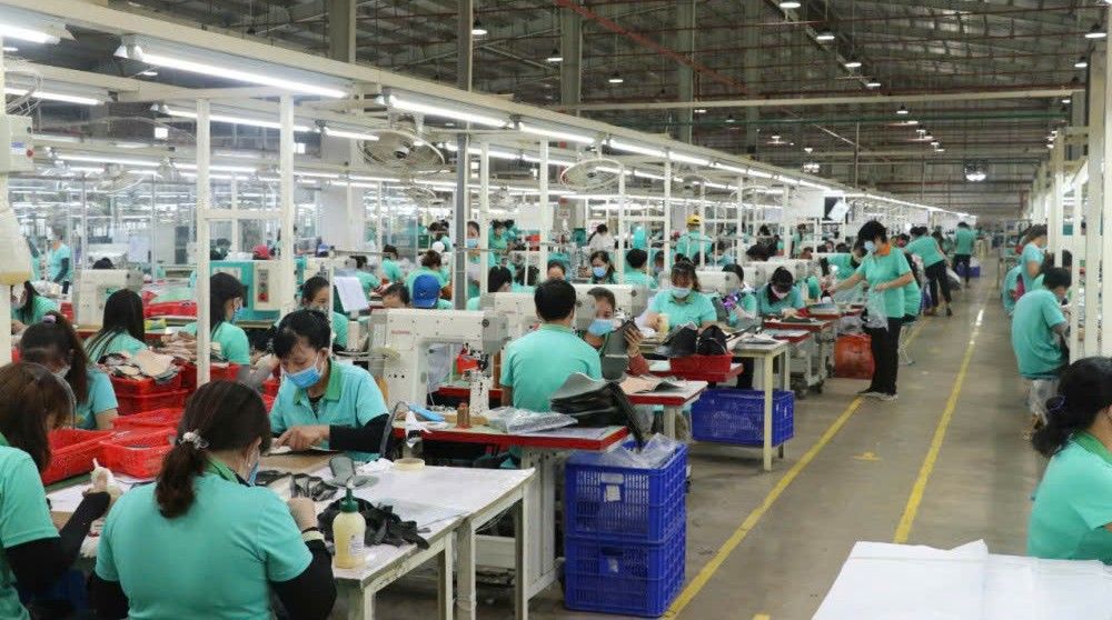 Cong nhan lao dong lam viec tai doanh nghiep o Tay Ninh. Anh minh hoa: Duy Minh