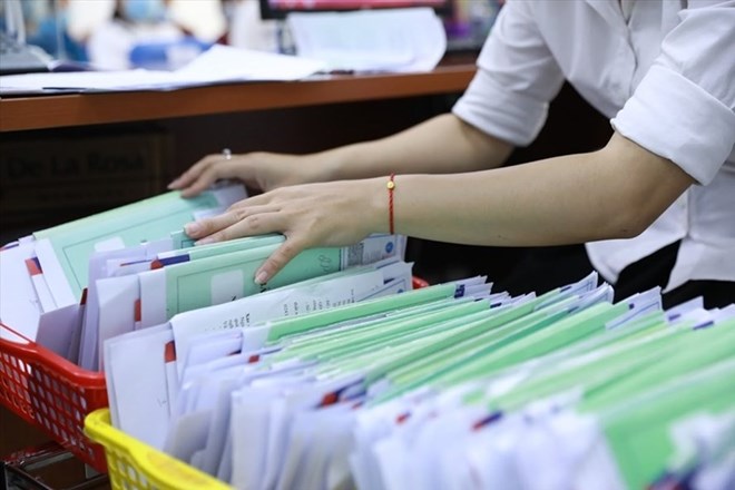 Employees will receive monthly unemployment benefits equal to 60% of their average salary, not exceeding 5 times the regional minimum wage. Photo: Hai Nguyen