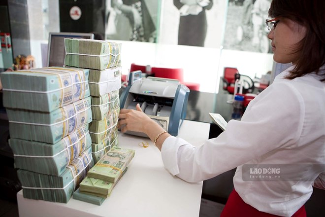 The Law on Deposit Insurance (amended) prohibits abusing positions and powers to violate the provisions of law on deposit insurance. Photo: Hai Nguyen