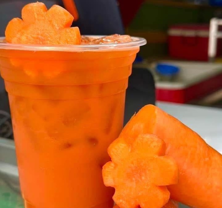 Carrot juice is good for workers working in industries that require high concentration, and eyes are easily tired. Photo: Tran Lan