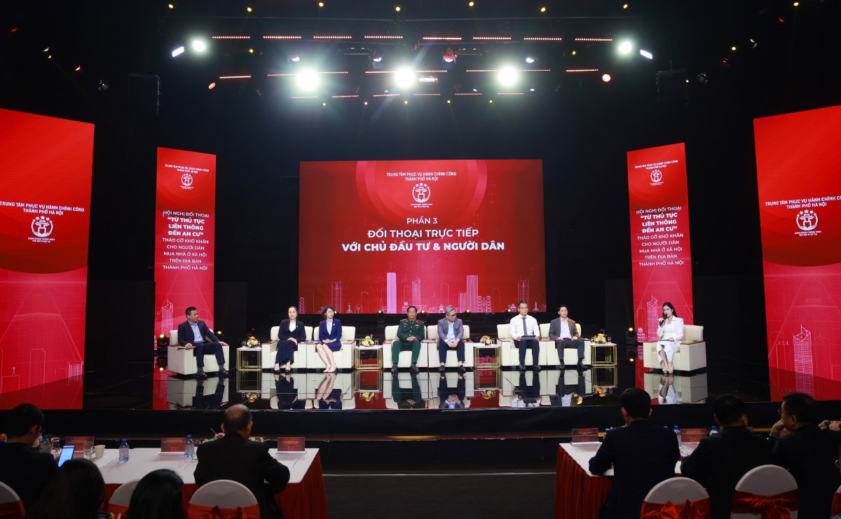 Conferencia 'Procedimientos interconectados para la vivienda: Resolviendo las dificultades para las personas que compran viviendas sociales en la ciudad de Hanoi'. Foto: Nhu Ha