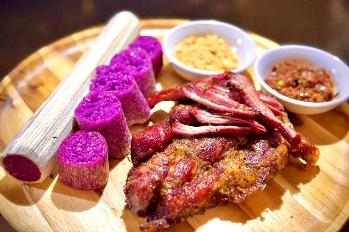 Northwestern brown rice can be served with grilled fish and smoked meat. Photo: Truong Son