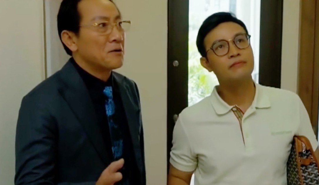 Meritorious Artist Hoang Hai and Meritorious Artist Thai Son in the movie "Familiar Family". Photo: Cut from video.