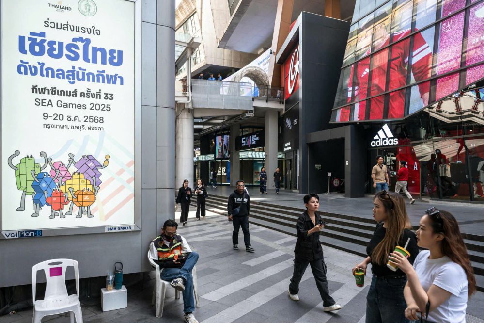 A plaque promoting the 33rd SEA Games was taken in the center of Bangkok. Photo: AFP