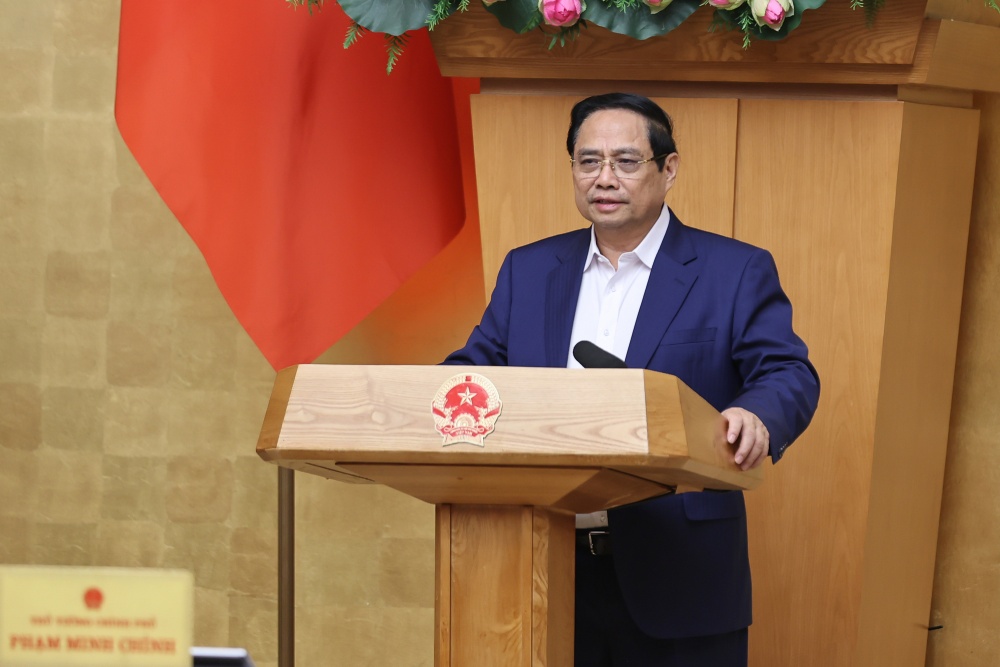 El miembro del Buro Politico y Primer Ministro Pham Minh Chinh señalo que los precios del oro y los precios de los bienes raices son altos. Foto: Nhat Bac