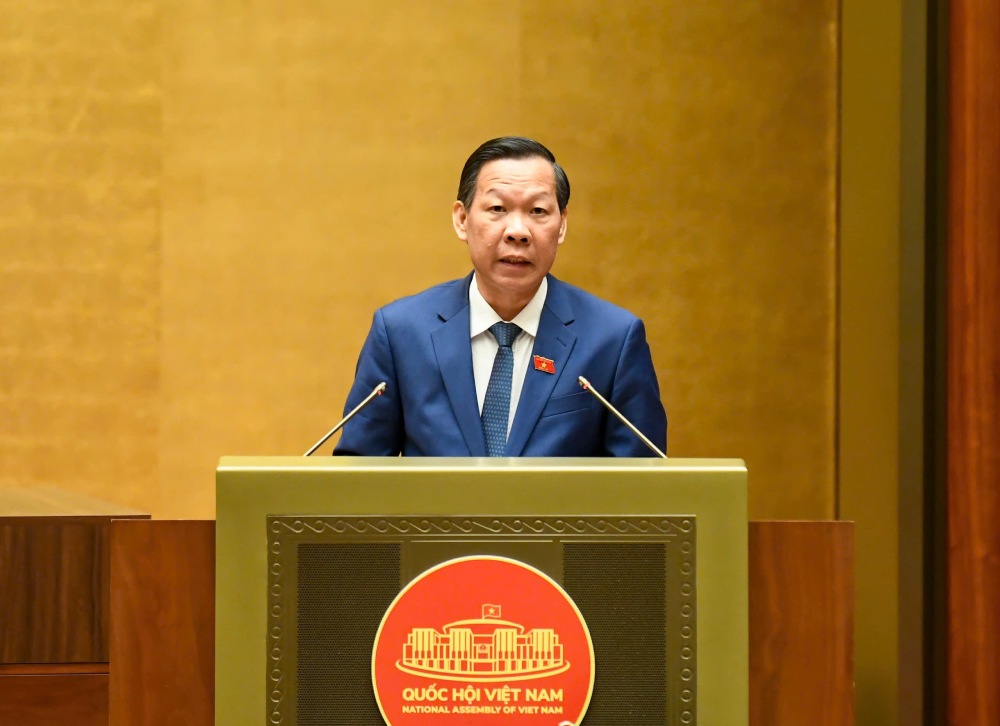Chairman of the Economic and Financial Committee Phan Van Mai presented a report on the review of the draft Law amending and supplementing a number of articles of the Law on Value Added Tax. Photo: Pham Dong
