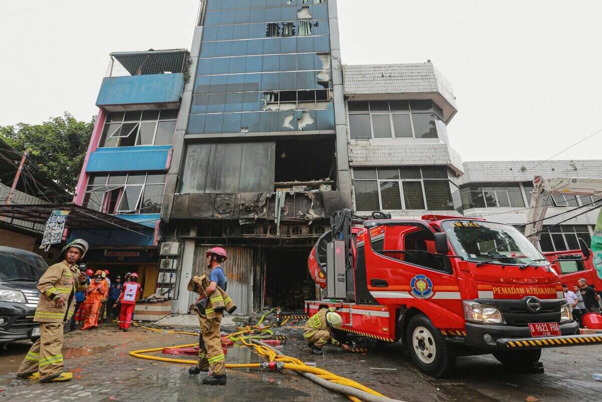Scene of the 7-storey house fire in Indonesia. Photo: AFP