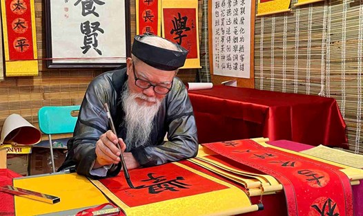 Tục khai bút và xin chữ đầu Xuân là nét văn hóa đẹp từ nhiều đời nay. Ảnh minh hoạ: Mai Chi