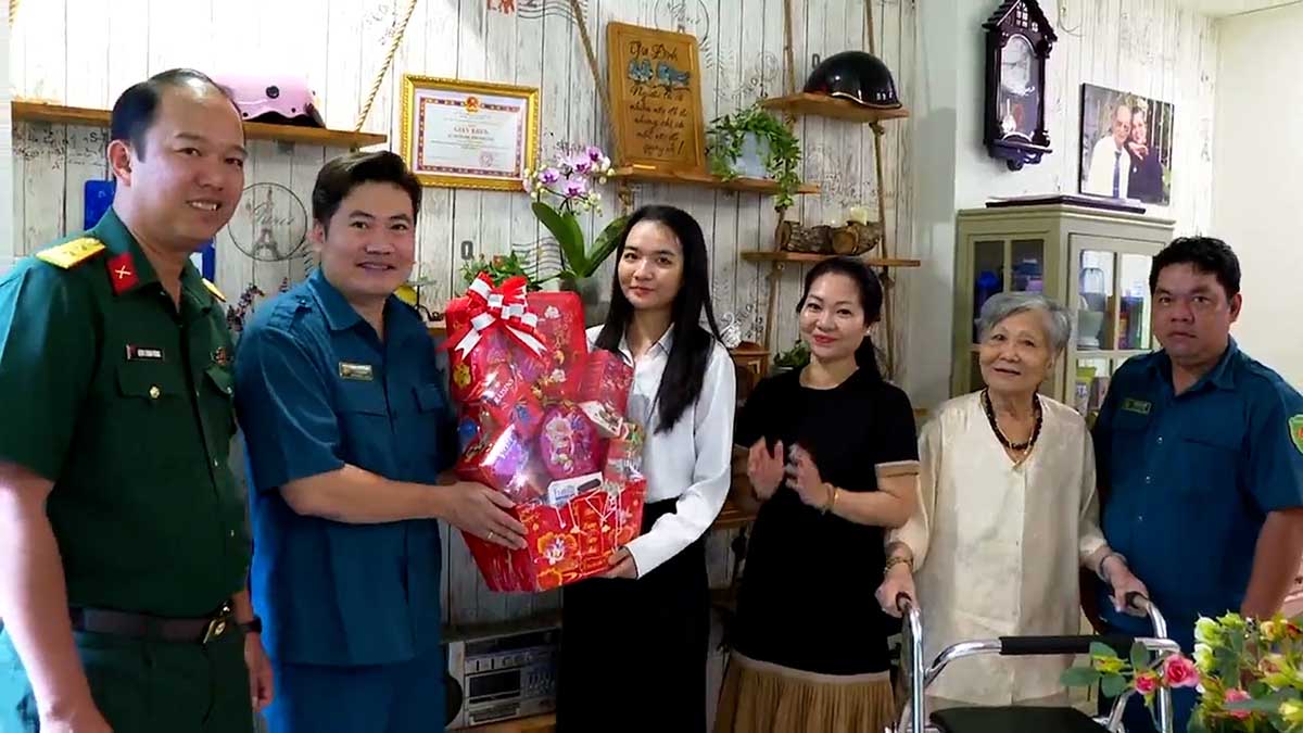 Young girl in Ho Chi Minh City writes application to volunteer for military service.