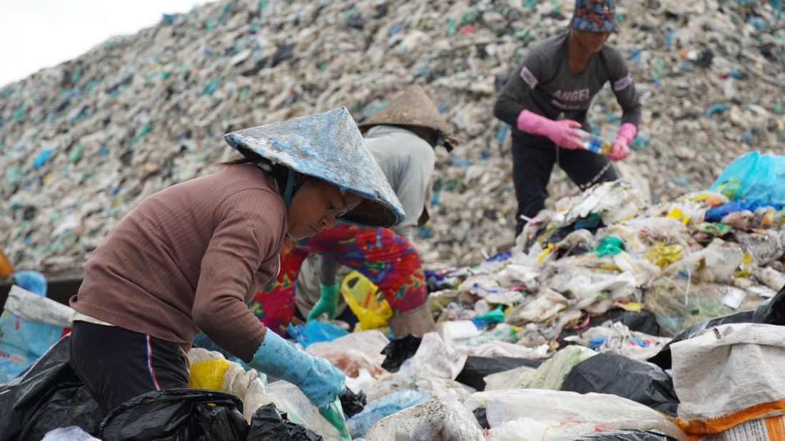 Garbage pickers face the risk of disease from the stench and infection from cuts on their hands and feet.