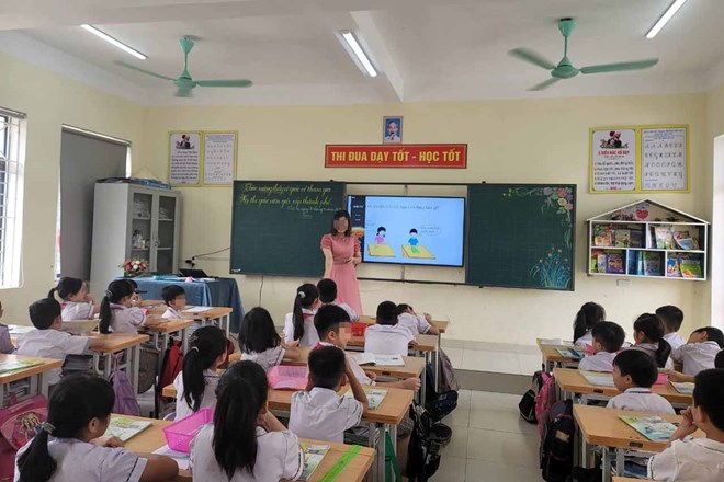 Illustration of extra teaching. Photo: Tran Tuan.