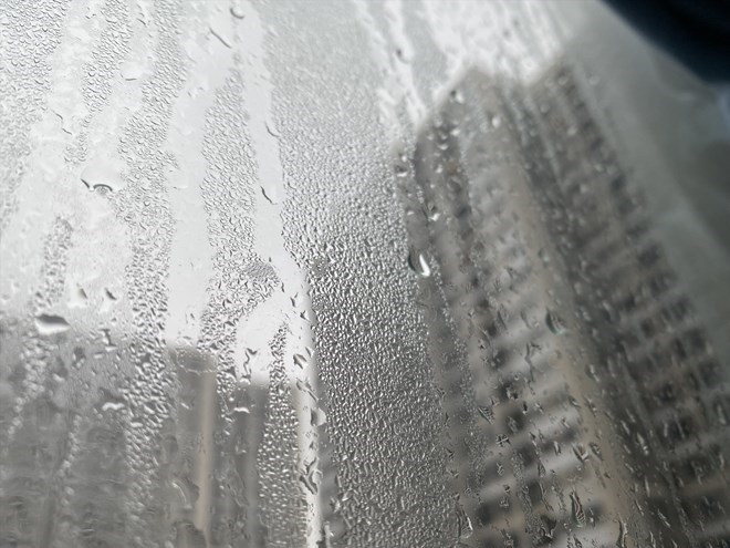 The windows of families were blocked with water and steam due to the humid weather. Photo: Huong Giang