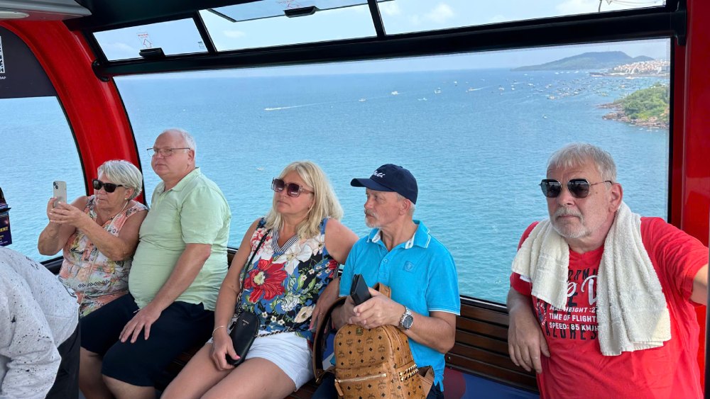 International tourists experience the world's longest 3-line cable car in Phu Quoc. Photo: Binh Minh