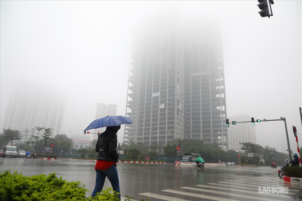 Weather forecast for Hanoi tomorrow morning, February 21, there will be light rain and fog. Photo: Quang Ngoc