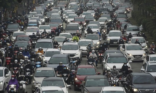 Dự báo thời tiết Hà Nội ngày mai 22.2 có mưa nhỏ kèm sương mù. Ảnh: Tùng Giang