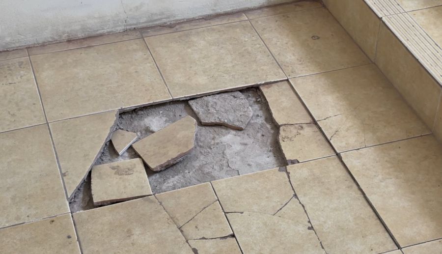 The brick floor is cracked in the staircase of CT1A building, workers' housing area in Kim Chung commune, Dong Anh district, Hanoi. Photo: Bao Han