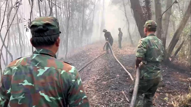 Cac luc luong tham gia chua chay rung hoi thang 4.2024 tren dia ban huyen Giang Thanh. Anh: Phuong Vu