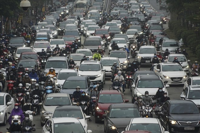 Weather forecast for tomorrow, February 28 in Hanoi will have drizzle with fog. Photo: Tung Giang