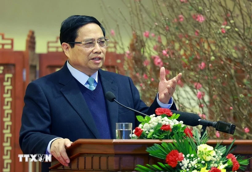 Prime Minister Pham Minh Chinh congratulates the banking sector on the occasion of the New Year of the Snake. Photo: Duong Giang/VNA