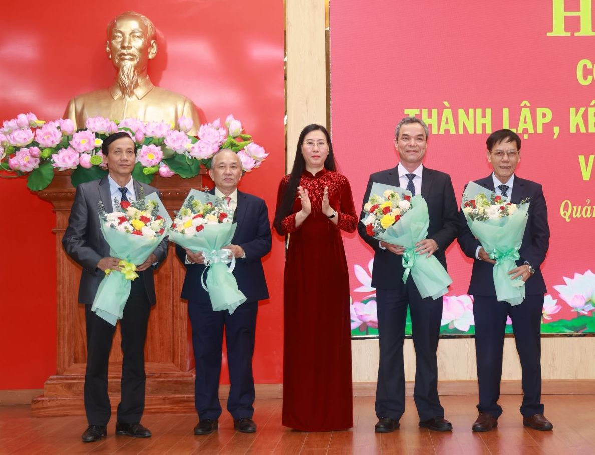 Mr. Dang Van Nghiep (far left), Mr. Nguyen Thanh (second from left), Mr. Nguyen Anh Dung (far right) and Mr. Dang Ngoc Dung (second from right) all applied for early retirement. Photo: Vien Nguyen