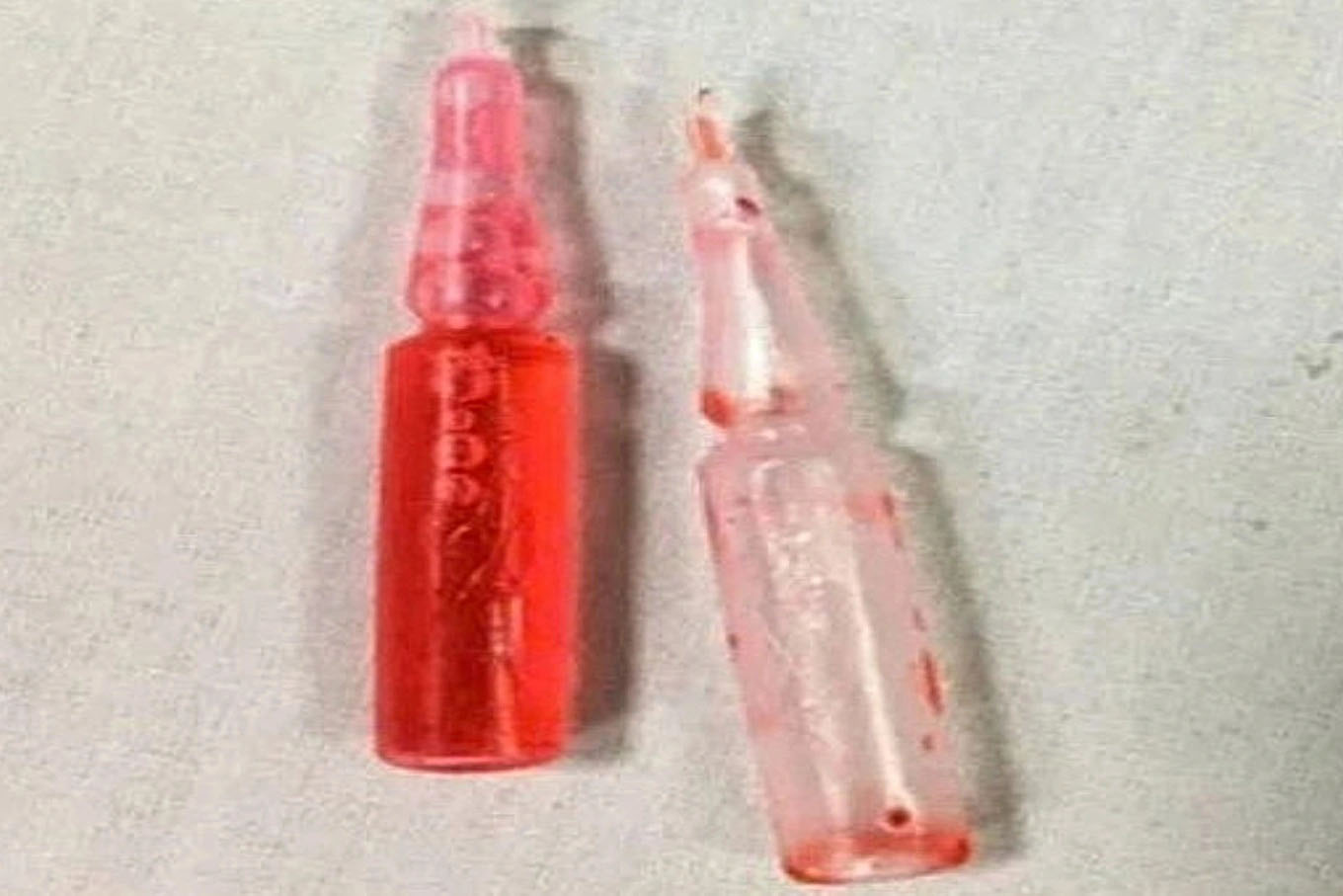 The bottle of poison is said to have been picked up by the two sisters H. in the field and they drank it, leading to the younger sister's death. Photo: Yen Phuc