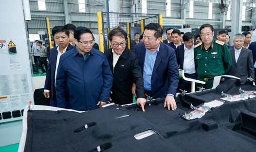 Ủy viên Bộ Chính trị, Thủ tướng Chính phủ Phạm Minh Chính và đoàn công tác khảo sát tại Tập đoàn Thaco. Ảnh: VGP/Nhật Bắc
