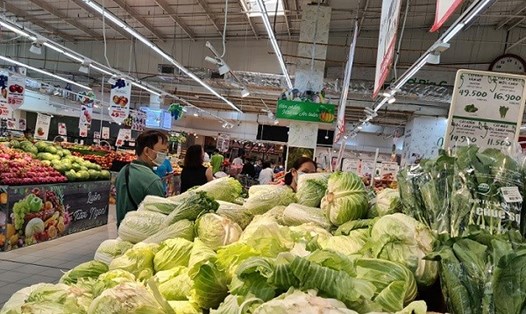 Nhiều bộ, ngành và địa phương đề xuất nâng mức giảm trừ gia cảnh để phù hợp với chỉ số giá cả hiện nay. Ảnh: Vũ Long