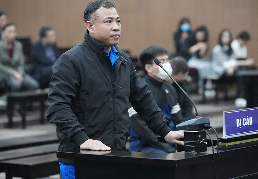 Bị cáo Nghiêm Quang Minh - chủ chung cư mini 9 tầng bị cháy. Ảnh: Quang Việt