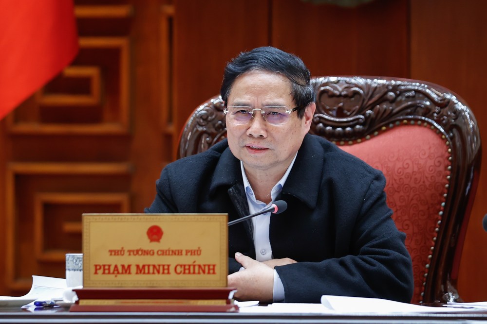 Politburo member and Prime Minister Pham Minh Chinh said that when reorganizing, the number of provincial-level administrative units will be reduced by about 50% compared to the present. Photo: Nhat Bac
