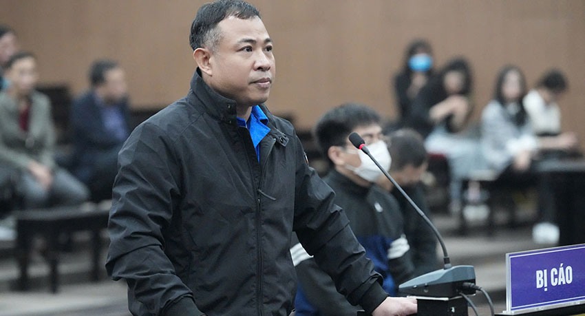 Bị cáo Nghiêm Quang Minh - chủ chung cư mini 9 tầng bị cháy, tại phiên tòa sơ thẩm. Ảnh: Quang Việt

