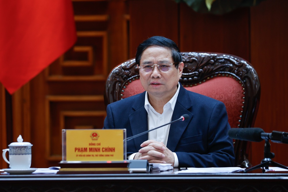 Politburo member and Prime Minister Pham Minh Chinh requested the development of a plan to organize and rearrange science and technology organizations. Photo: VGP