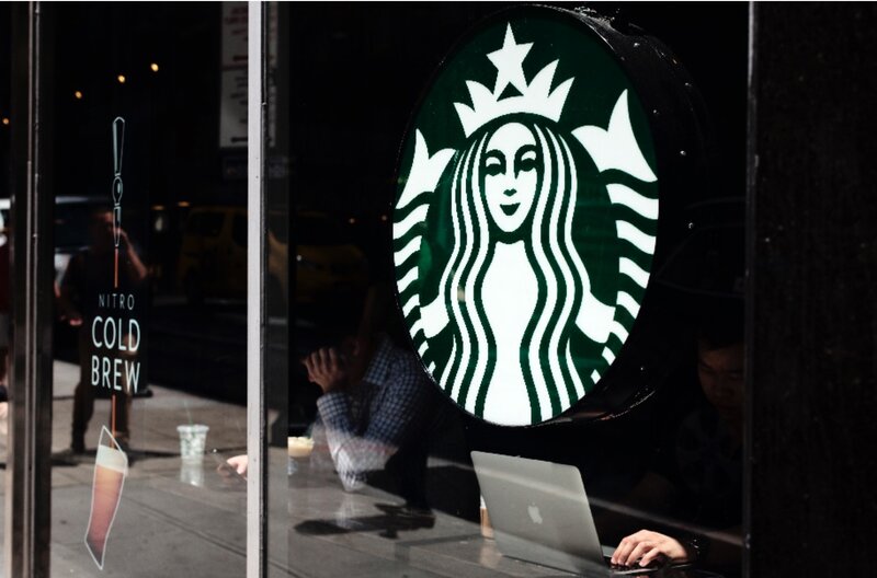 Starbucks must compensate up to $50 million for customers who were splashed with hot tea. Photo: Xinhua