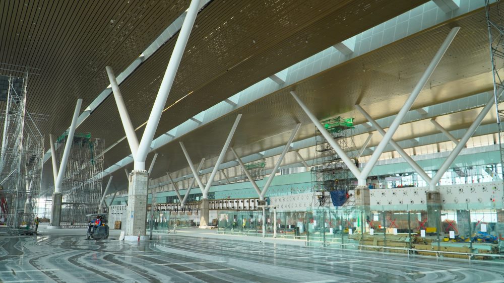 Racing against time, workers rush to complete terminal T3