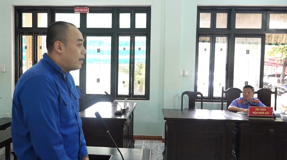 Portrait of defendant Minh receiving a prison sentence.