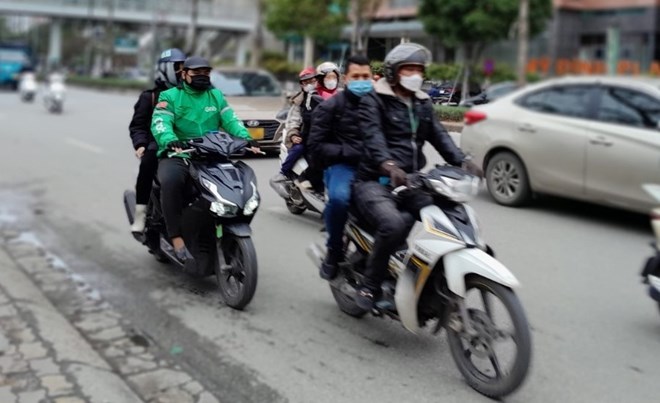 Motorbike taxi is in operation. Photo: Xuyen Dong