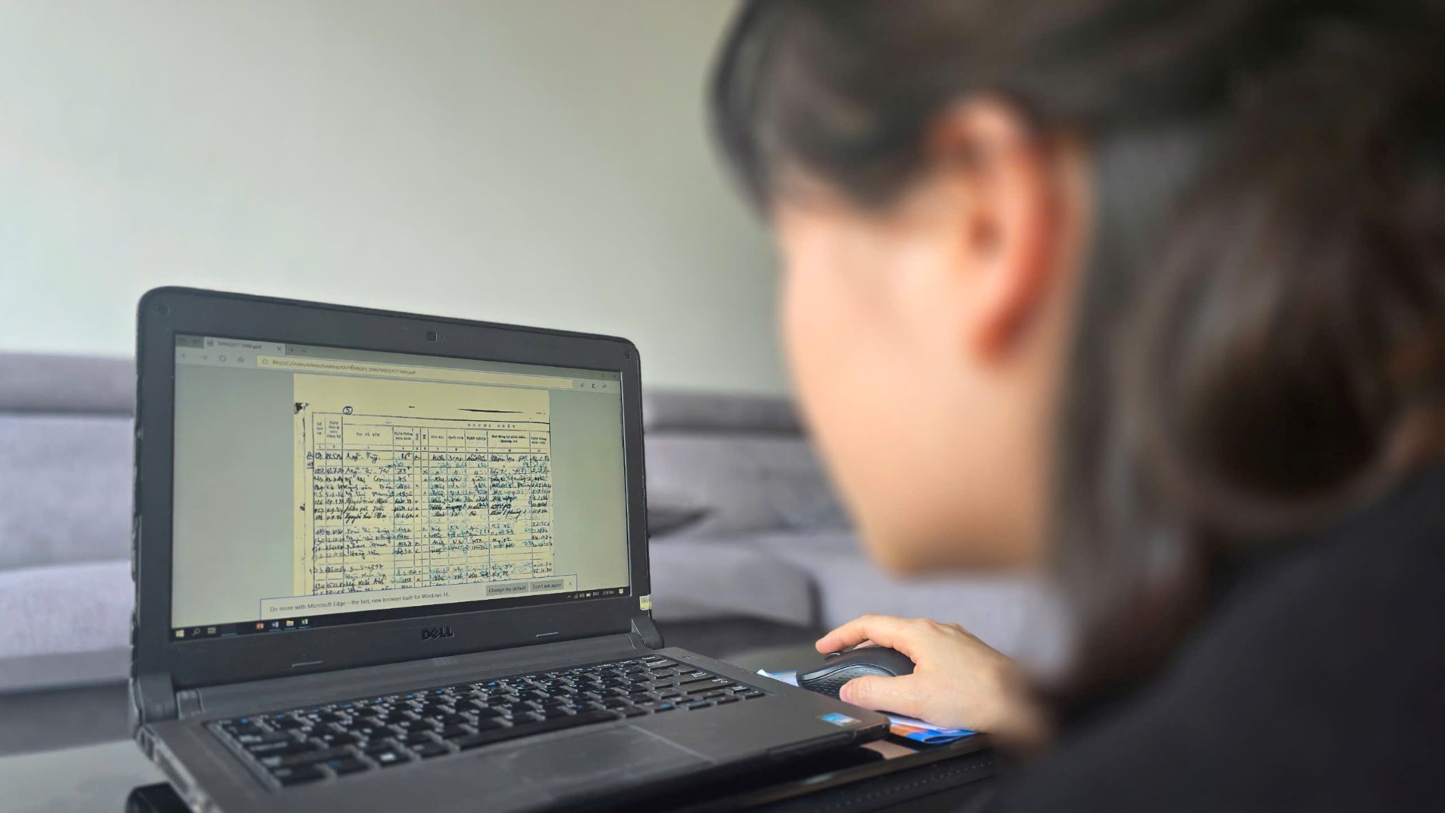 Information recorded by hand in the paper book will be digitized for civil status data. Photo: Han Nguyen