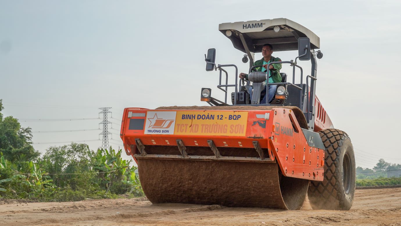 Workers constructing the expressway section through Soc Trang province