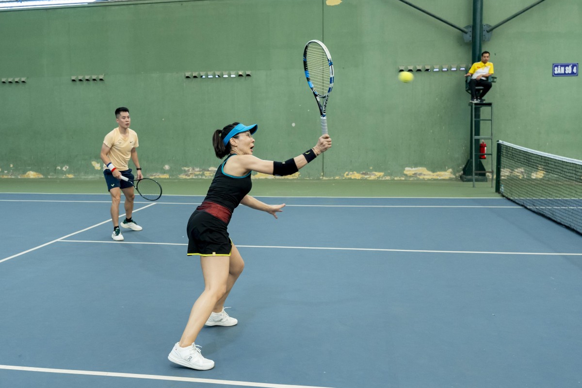 Competing in the first National Women's Amateur Tennis Tournament. Photo: Organizing Committee
