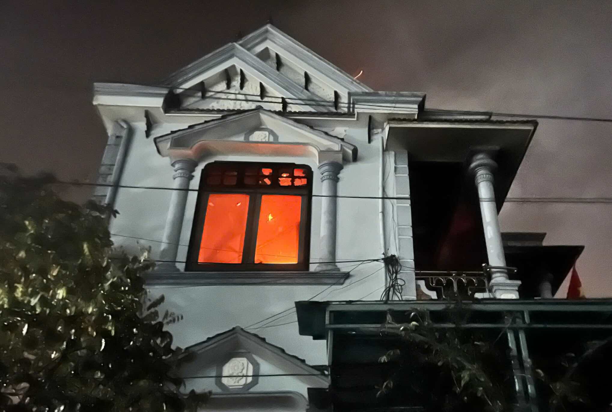 The second floor of a house in Quang Binh province caught fire at night. Photo: Van Son